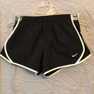 Black Nike running shorts